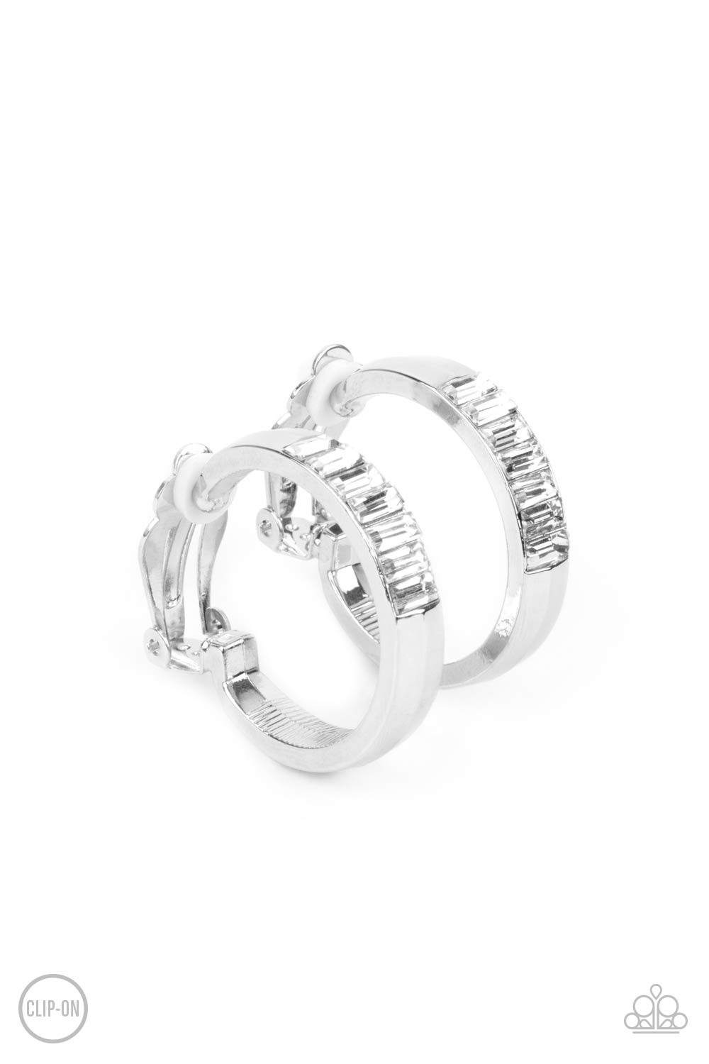 Ready, Steady, Glow - White Clip-On Hoop Earrings featuring emerald style cuts, a row of glassy white rhinestones adorn the top front of a thick silver hoop for a classic finish. Earring attaches to a standard clip-on fitting. Sold as one pair of clip-on earrings.