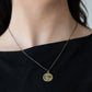 Hold On To Hope - Brass Inspirational Necklaces stamped in a whimsical flower, a dainty brass disc is stamped in the word, "Hope," creating an inspirational pendant below the collar. Features an adjustable clasp closure.  Sold as one individual necklace. Includes one pair of matching earrings.  Paparazzi Jewelry is lead and nickel free so it's perfect for sensitive skin too!