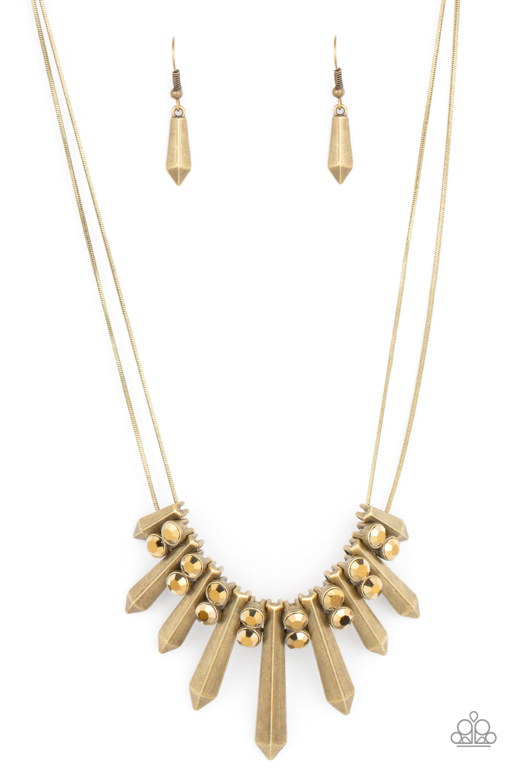 Paparazzi Accessories Dangerous Dazzle - Brass Necklaces Pairs of glittery aurum rhinestones alternate between flared brass rods that are threaded along two rows of flat brass chains, creating a dangerous fringe below the collar. Features an adjustable clasp closure. Sold as one individual necklace. Includes one pair of matching earrings. Paparazzi Jewelry is lead and nickel free so it's perfect for sensitive skin too!