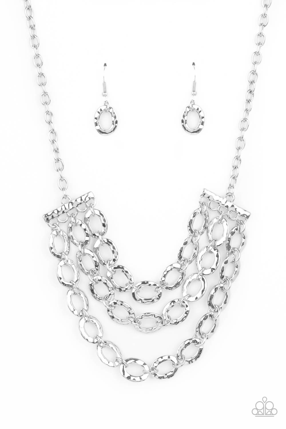 Repeat After Me - Silver Oval Link Necklaces three rows of shiny silver chains with oversized hammered oval links attach to silver bars for an edgy display below the collar. Features an adjustable clasp closure.  Sold as one individual necklace. Includes one pair of matching earrings.  Paparazzi Jewelry is lead and nickel free so it's perfect for sensitive skin too!