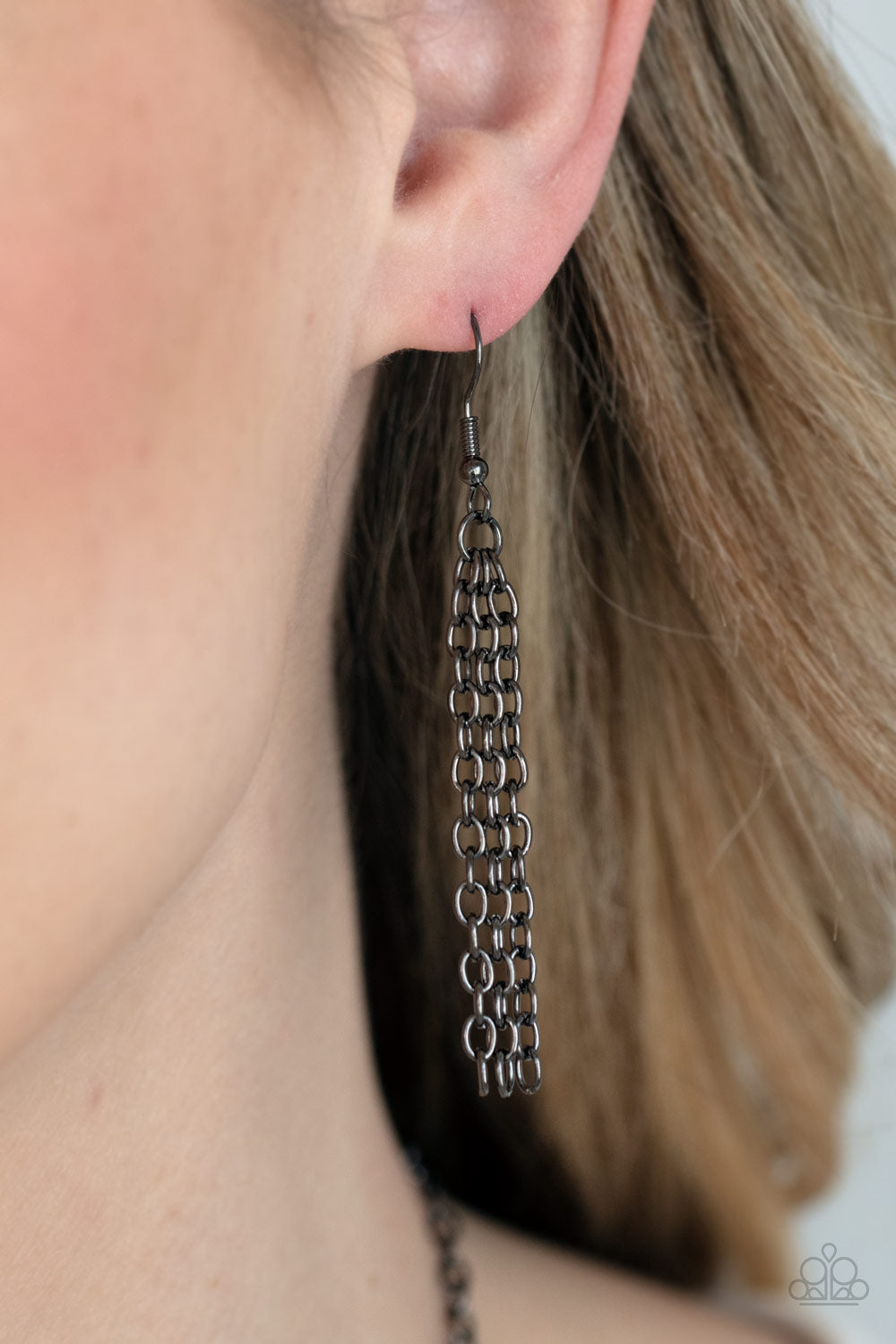 Guide To The Galaxy - Black Triangular Cutout Necklaces large triangular cutouts stamped in a lightly dotted texture link below the collar forming a dramatic display of gunmetal slices. Features an adjustable clasp closure.