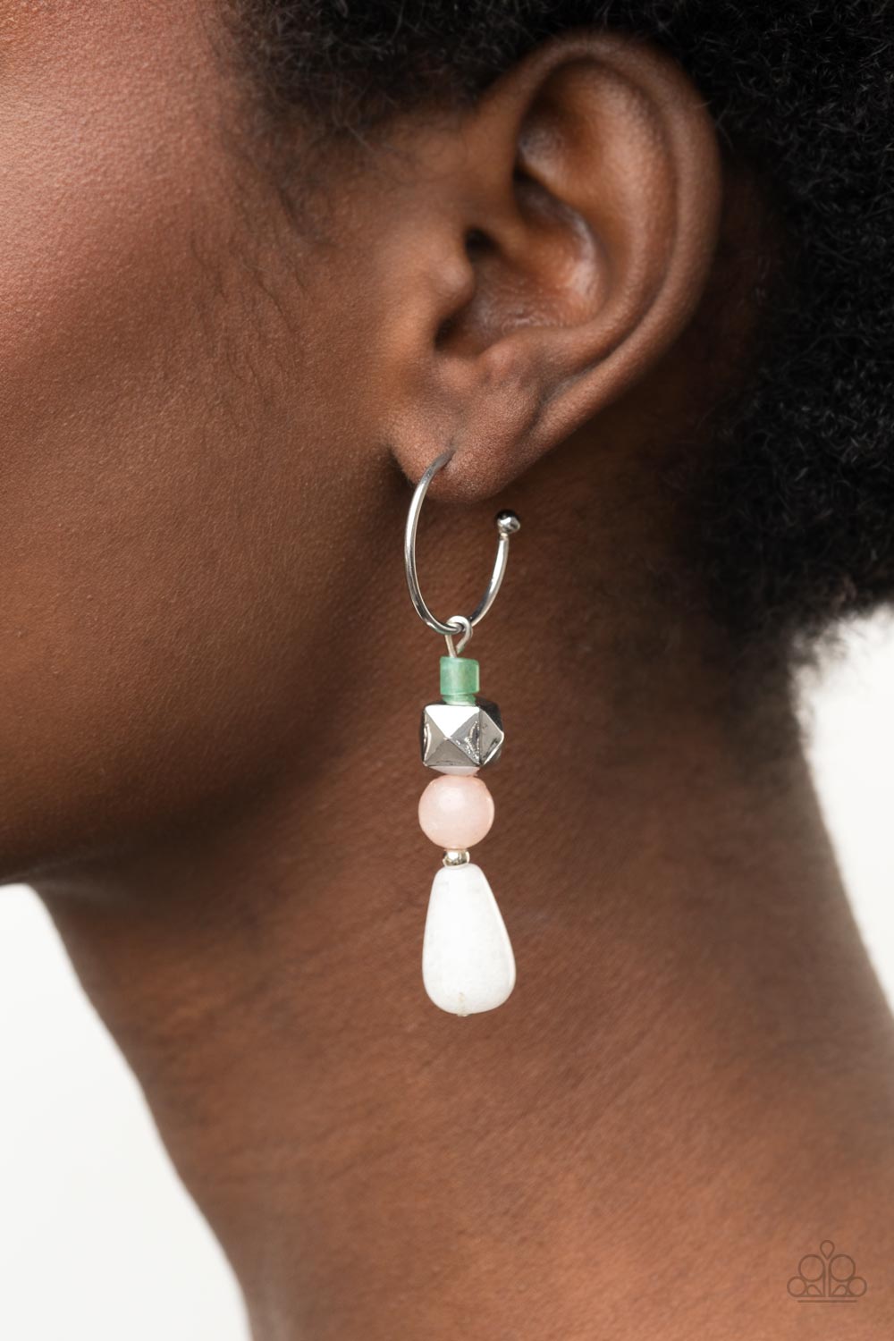 Boulevard Stroll - Multi Square Bead Earrings a charismatic collection of jade, pink, and white stone beads, accented with a silver faceted square bead, are threaded onto a silver pin which dangles from a dainty silver hoop. Earring attaches to a standard post fitting. Hoop measures approximately 3/4" in diameter. Sold as one pair of hoop earrings.