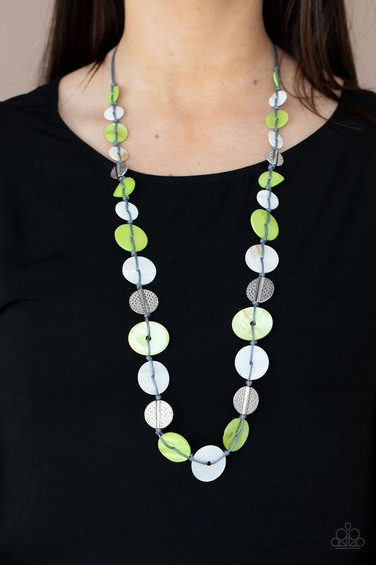 Paparazzi Accessories Seashore Spa - Green Necklaces infused with hammered silver discs, an assortment of green and white shell-like discs are knotted in place along a gray cord, creating a summery display across the chest. Features an adjustable clasp closure.