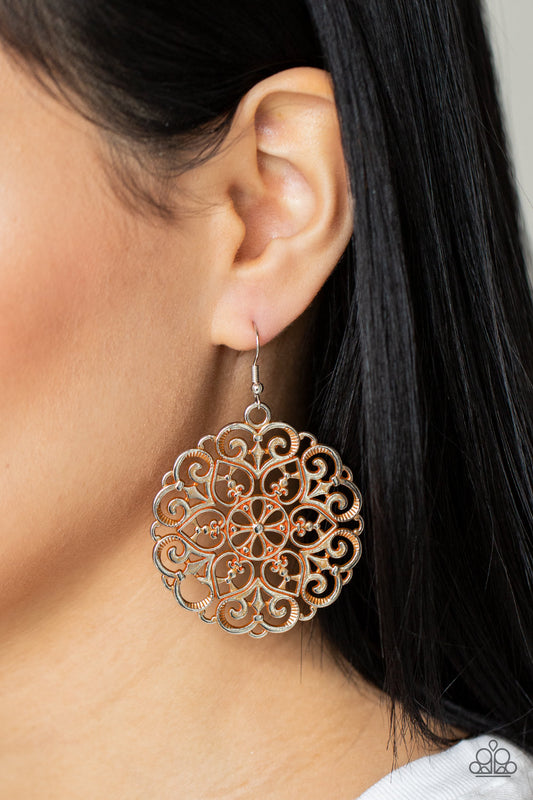 Paparazzi MANDALA Effect - Orange Rustic Earrings brushed in a rustic orange finish, an oversized mandala-like silver frame swings from the ear for a seasonal pop of color. Earring attaches to a standard fishhook fitting.  Sold as one pair of earrings.