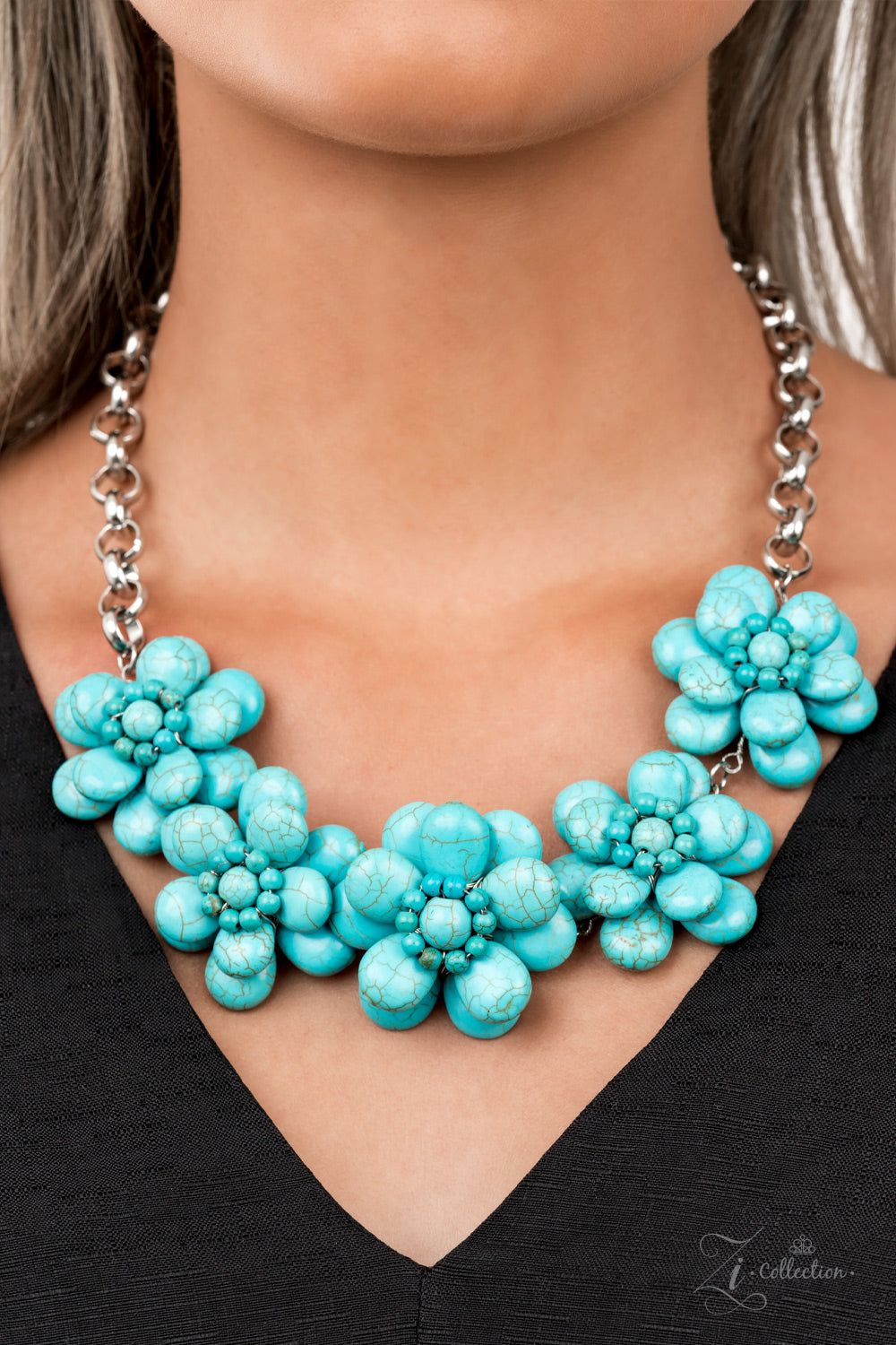 Genuine - Turquoise Stone Petal 2021 Zi Collection Necklaces dainty silver wire delicately wraps around earthy turquoise stone teardrop petals that beautifully layer into bountiful blossoms. Featuring turquoise stone beaded centers, the harmonious stone flowers gracefully connect to a substantial silver chain for an authentically artisan look below the collar. Features an adjustable clasp closure.  Sold as one individual necklace. Includes one pair of matching earrings.
