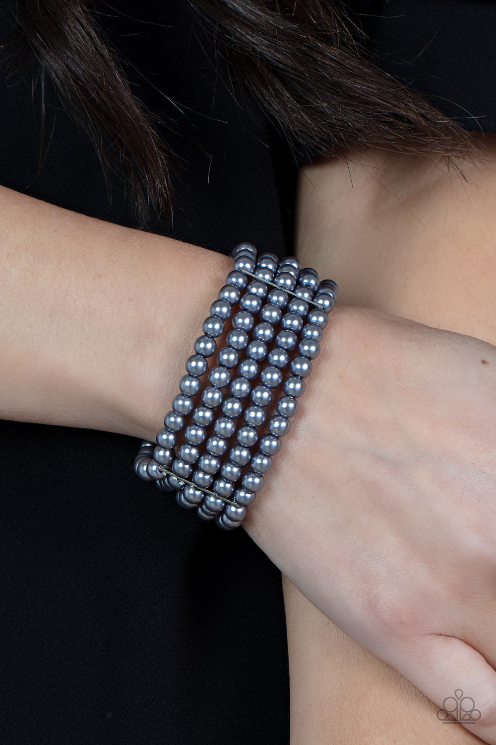 A Pearly Affair - Silver Grey Pearl Stretch Bracelets stacked layers of luminous grey pearl-like beads are threaded along stretchy bands creating a subtly indulgent allure around the wrist. Sold as one individual bracelet. Paparazzi Jewelry is lead and nickel free so it's perfect for sensitive skin too!