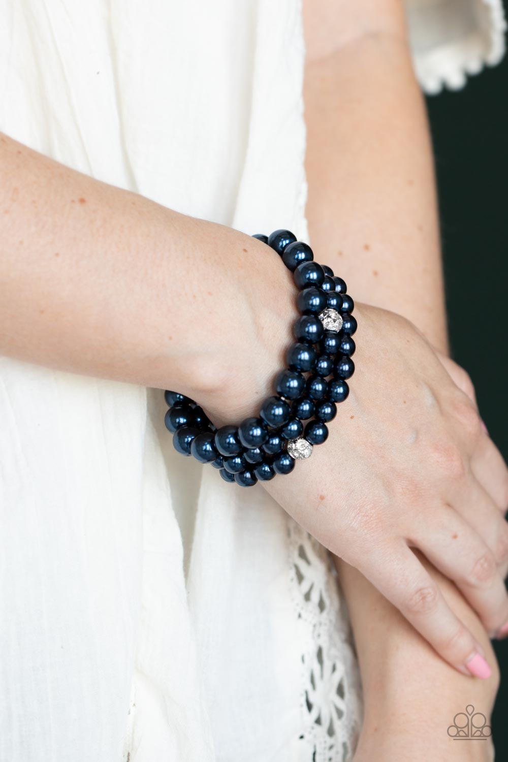 Here Comes the Heiress - Blue Pearl Stretch Bracelets infused with white rhinestone encrusted silver beads, a bubbly collection of mismatched blue pearls are threaded along stretchy bands around the wrist for a vintage inspired layered look. Sold as one set of three bracelets.