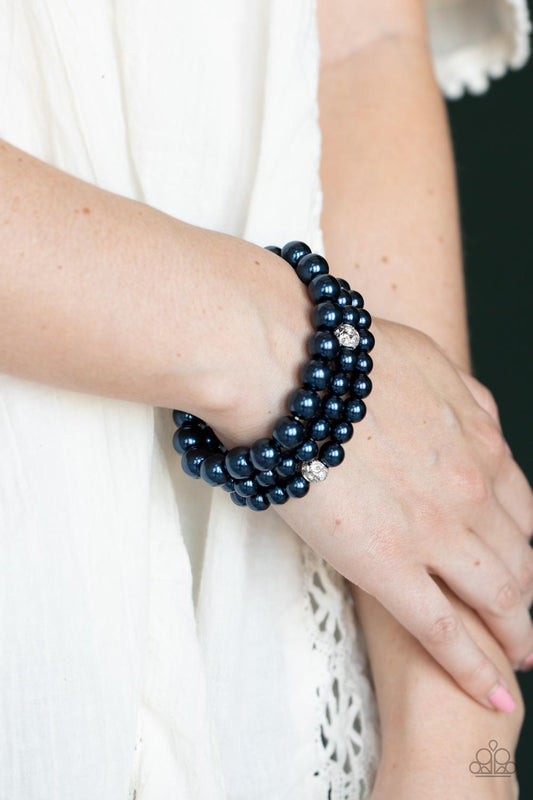 Here Comes the Heiress - Blue Pearl Stretch Bracelets infused with white rhinestone encrusted silver beads, a bubbly collection of mismatched blue pearls are threaded along stretchy bands around the wrist for a vintage inspired layered look.  Sold as one set of three bracelets.