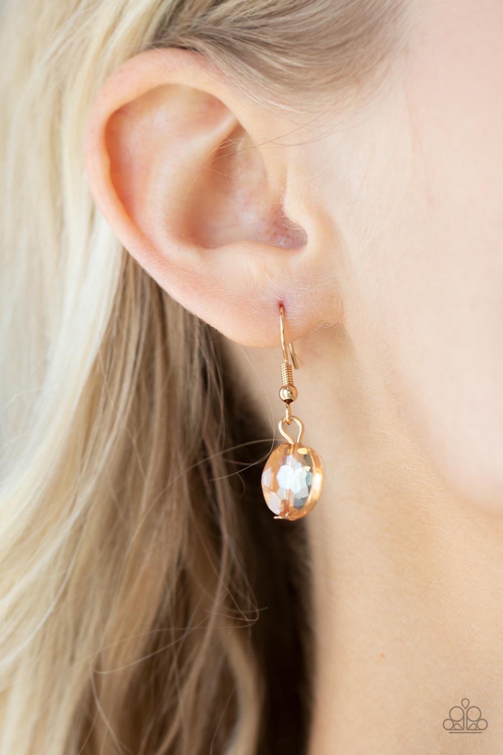 Cosmic Closeup - Gold Iridescent Necklaces brushed in an iridescent finish, a faceted collection of oversized golden gems delicately links below the collar for a gritty glamorous look. Features an adjustable clasp closure. Sold as one individual necklace. Includes one pair of matching earrings. Paparazzi Jewelry is lead and nickel free so it's perfect for sensitive skin too!