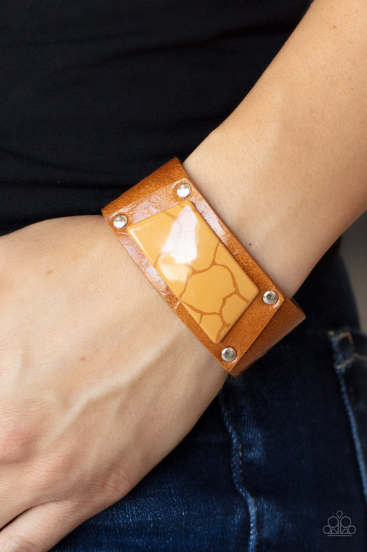 Geo Glamper - Brown Leather Bracelets featuring a faux marble finish, a brown acrylic centerpiece attaches to a tan leather frame that is studded in place along a distressed tan leather band for a colorfully rustic fashion. Features an adjustable snap closure.  Sold as one individual bracelet.