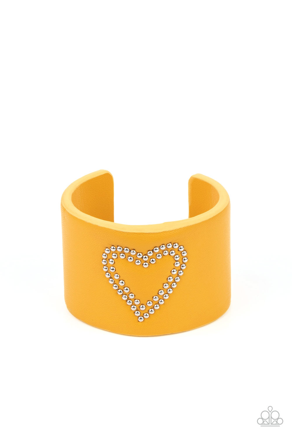 Rodeo Romance - Yellow Leather Heart Cuff Bracelets the center of a yellow leather cuff is studded in a charming heart pattern, creating a rustically romantic look around the wrist. Sold as one individual bracelet.