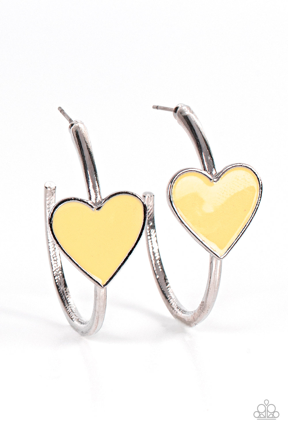 Kiss Up - Yellow Heart Hoop Earrings a charming Illuminating heart adorns the front of a classic silver hoop resulting in a whimsical fashion. Earring attaches to a standard post fitting. Hoop measures approximately 1 1/4" in diameter.  Sold as one pair of hoop earrings.  Paparazzi Jewelry is lead and nickel free so it's perfect for sensitive skin too!