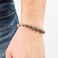 Keep the Peace - Silver Natural Stone Bracelets infused with silver accents, an earthy collection of natural stones are threaded along a stretchy band around the wrist for a tranquil look.  Sold as one individual bracelet.