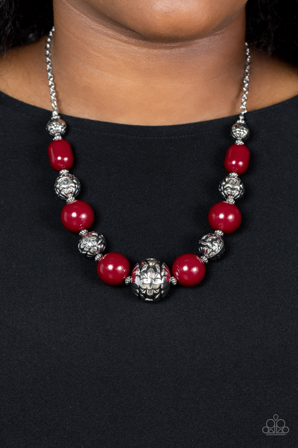 Paparazzi Accessories - Girl Meets Garden - Red Necklaces an oversized collection of wine colored beads and antiqued silver beads wrapped in a whimsical floral motif alternates along an invisible wire below the collar, resulting in a hearty pop of color. Features an adjustable clasp closure.  Sold as one individual necklace. Includes one pair of matching earrings.