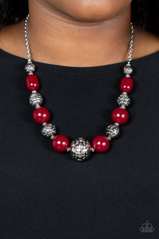 Paparazzi Accessories - Girl Meets Garden - Red Necklaces an oversized collection of wine colored beads and antiqued silver beads wrapped in a whimsical floral motif alternates along an invisible wire below the collar, resulting in a hearty pop of color. Features an adjustable clasp closure.  Sold as one individual necklace. Includes one pair of matching earrings.