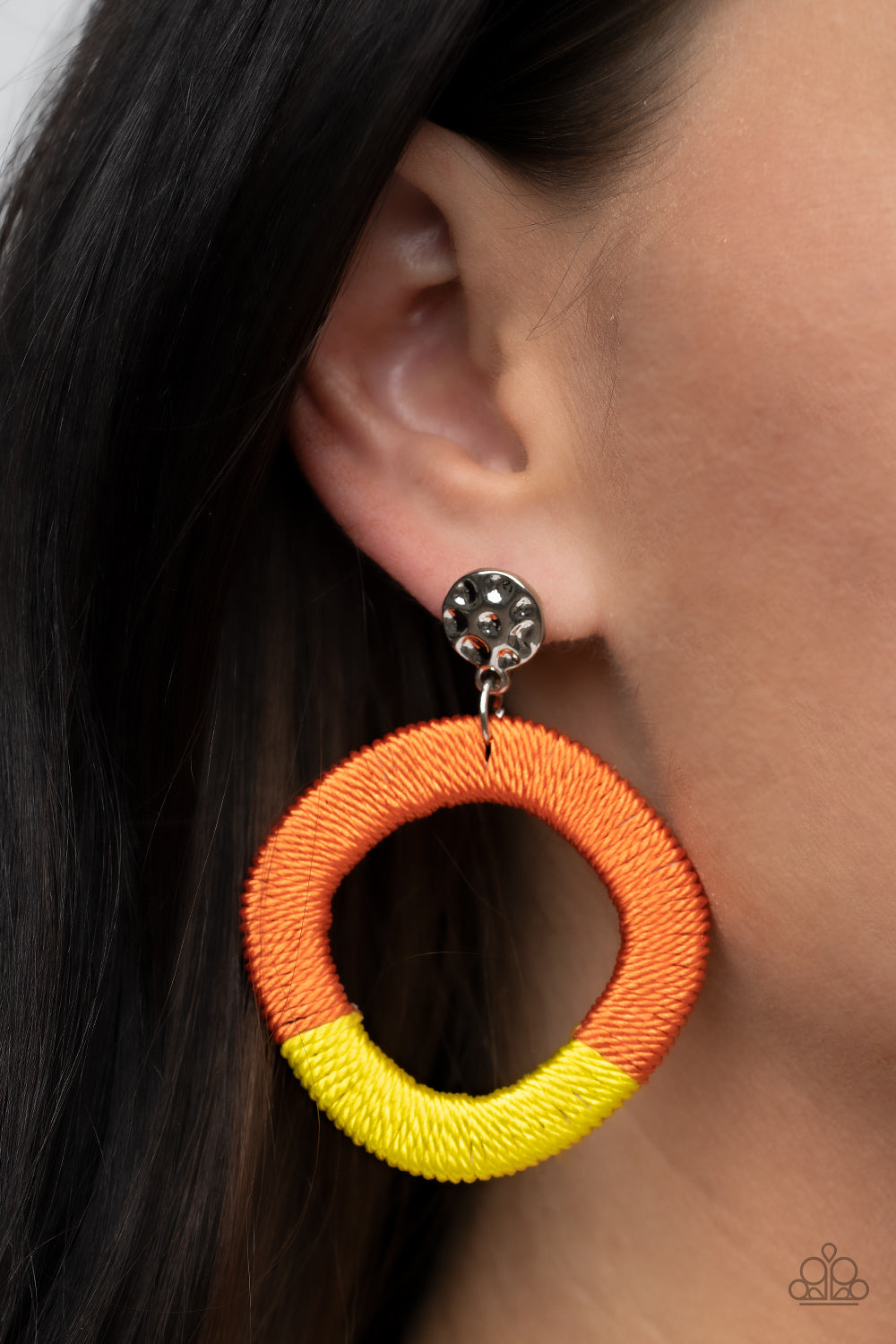 Thats a WRAPAROUND - Multi Threaded Earrings a hammered silver disc gives way to a wooden frame decoratively wrapped in shiny orange and yellow threaded accents, creating a colorful lure. Earring attaches to a standard post fitting.  Sold as one pair of post earrings.
