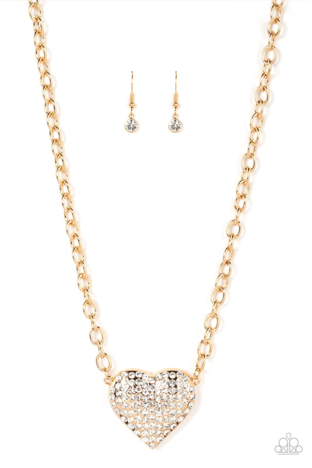 Heartbreakingly Blingy - Gold Rhinestone Heart Necklaces a dramatically oversized gold heart frame is encrusted in row after row of dazzling white rhinestones, resulting in a heart-racing sparkle below the collar. Features an adjustable clasp closure.  Sold as one individual necklace. Includes one pair of matching earrings.