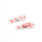 What a Sweetheart - Multi Heart Hair Clip a flirtatious collection of red, white, and pink hearts flutter back and forth inside a clear plastic frame, creating a charming eye-catching pop of color. Features standard snap hair clips on the back.  Sold as one pair of hair clips.