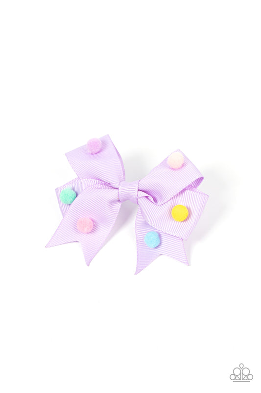 Pom Poms Promenade - Purple Hair Clip dainty multicolored pom poms dot the front of a ribbed purple ribbon that neatly knots into a charming bow, creating a whimsical centerpiece. Features a standard hair clip on the back.  Sold as one individual hair clip.