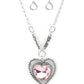 Paparazzi Accessories Heart Full of Fabulous - Pink Heart Necklaces bordered in spun silver ribbons, an oversized Gossamer Pink heart gem is pressed into a silver heart frame below the collar. The flirtatious pendant attaches to silver rings and decorative silver frames dotted in white rhinestones, resulting in a dash of vintage inspired romance. Features an adjustable clasp closure.  Sold as one individual necklace. Includes one pair of matching earrings.
