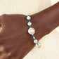 Contemporary Coastline - Blue Seedbead Bracelets rregular-shaped pearls in varying sizes are scattered amongst blue and yellow seed beads that are threaded along a wire, resulting in a refreshing and playful style around the wrist. Features an adjustable clasp closure.  Sold as one individual bracelet.  Get The Complete Look! Necklace: "Modern Marina - Blue" (Sold Separately