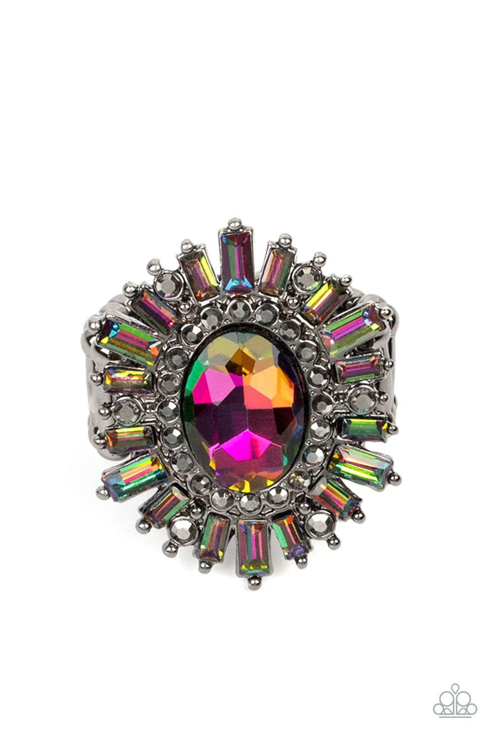 Paparazzi Accessories - Astral Attitude - Multi Oil Spill August 2022 Life of the Party Rings a large oil spill rhinestone sparkles inside a ring of dainty hematite rhinestones. Emerald cut oil spill and hematite rhinestones fan out from the dazzling center, exploding into a stellar centerpiece atop the finger. Features a stretchy band for a flexible fit. Due to its prismatic palette, color may vary.  Sold as one individual ring.