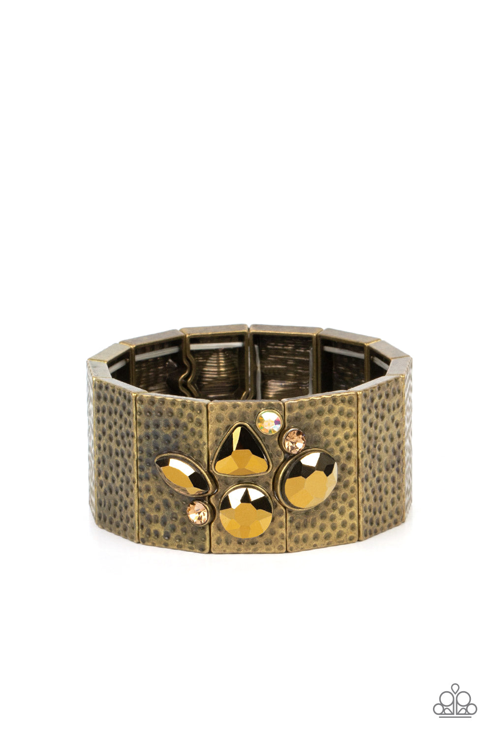 Paparazzi Accessories Flickering Fortune - Brass Hammered Convention Bracelets hammered in gritty shimmer, rustic, rectangular, brass frames are threaded along stretchy bands that wrap around the wrist. Mismatched topaz, iridescent, and aurum rhinestones cluster on the front and back of the piece, creating dueling centerpieces. Due to its prismatic palette, color may vary. Sold as one individual bracelet. 2022 Glow Convention
