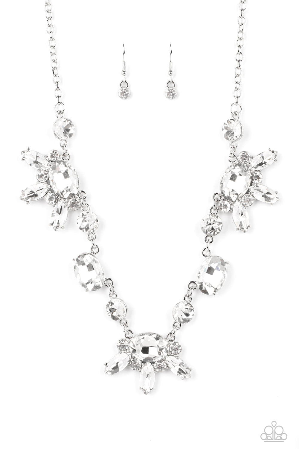 Paparazzi Accessories Glow-Trotting Twinkle - White Rhinestone Convention Necklaces brilliant white rhinestones in round, oval, and marquise cuts, create an abstract pattern as they fall along the neckline. The faceted surfaces of each gem catch and reflect light from every angle, resulting in a timelss, twinkling statement piece. Features an adjustable clasp closure. Sold as one individual necklace. Includes one pair of matching earrings. 2022 Glow Convention
