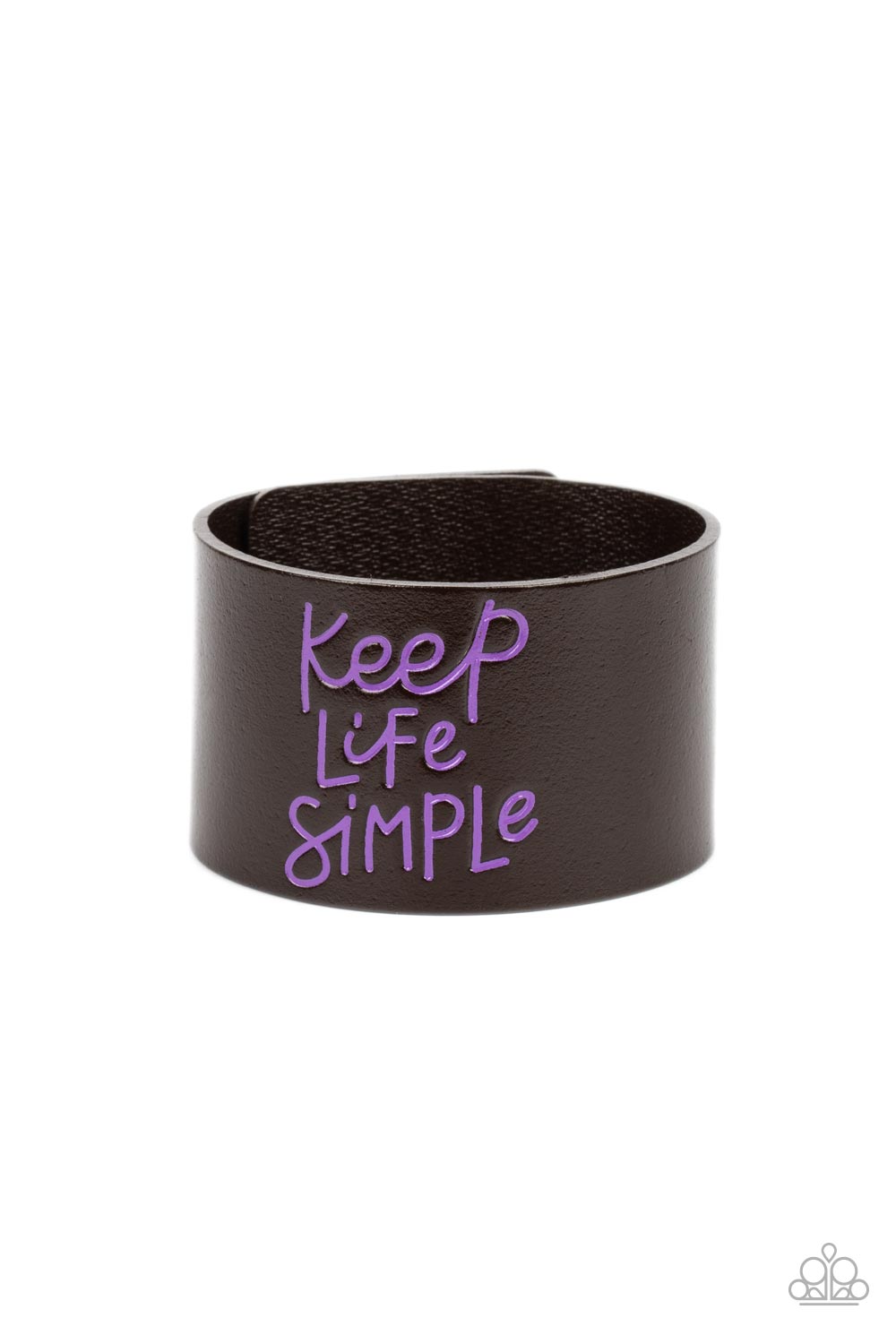 Paparazzi Accessories - Simply Stunning - Purple Inspirational Bracelets a thick band of dark brown leather is stamped in the phrase, "Keep Life Simple," in purple script. The playful font emphasizes the lighthearted message as the band wraps around the wrist in a casual finish. Features an adjustable snap closure.  Sold as one individual bracelet.