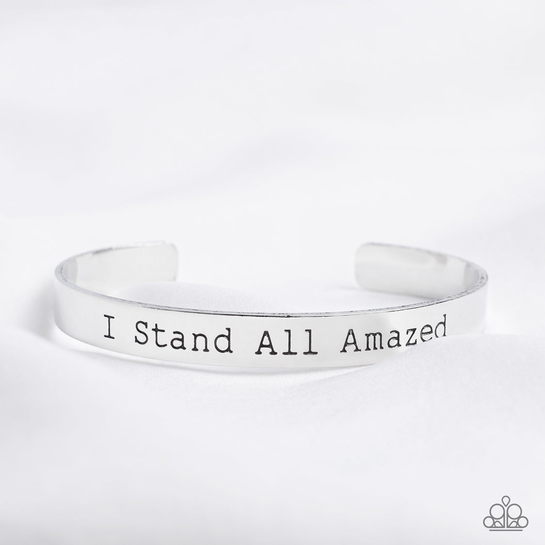 Paparazzi Accessories - I Stand All Amazed - Silver Inspirational Bracelets a simplistic, shiny, silver cuff is stamped with the phrase "I Stand All Amazed," for a divine, light-catching design across the wrist. Sold as one individual bracelet.