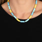 Rubber discs in shades of Waterspout, Primrose, and turquoise are threaded along an invisible wire, adorning the collar in a courageous pop of color. Shiny silver discs separate the bands of color, adding a hint of industrial sheen to the youthful design. Features an adjustable clasp closure.  Sold as one individual necklace. Includes one pair of matching earrings.