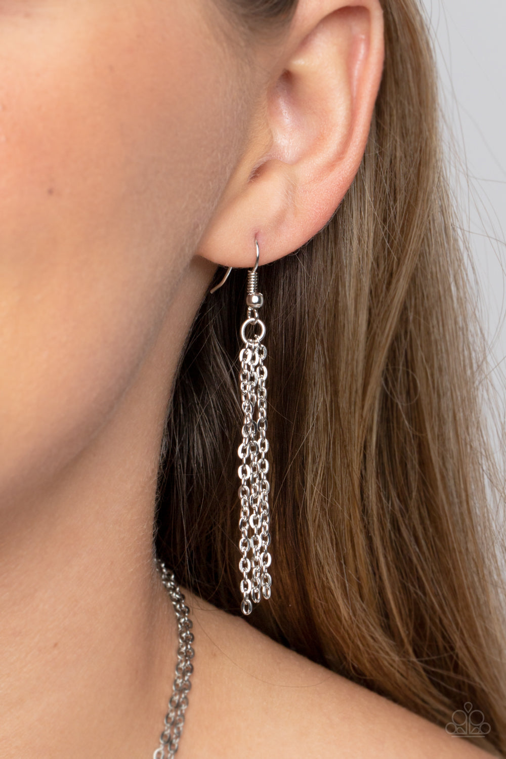 Paparazzi Accessories - Crystal Catwalk - Pink Necklace chiseled into a colorful collection, two layers of transparent pink crystal-like stones swings from the bottom of two dainty silver chains for a handcrafted, artisanal look. Features an adjustable clasp closure. As the stone elements in this piece are natural, some color variation is normal.  Sold as one individual necklace. Includes one pair of matching earrings.