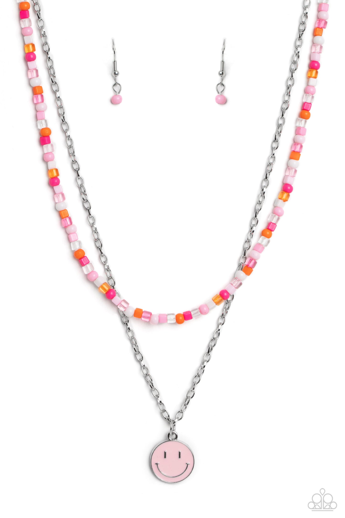 Paparazzi Accessories - High School Reunion - Pink Smiley Necklace Gliding from a dainty, silver chain, a smiley face pendant stands out against a pink backdrop. Completing the charismatic ensemble, a collection of seed beads in shades of light pink, white, pink, orange, and hot pink create bright pops of color around the neckline for a youthful finish. Features an adjustable clasp closure. Sold as one individual necklace. Includes one pair of matching earrings.