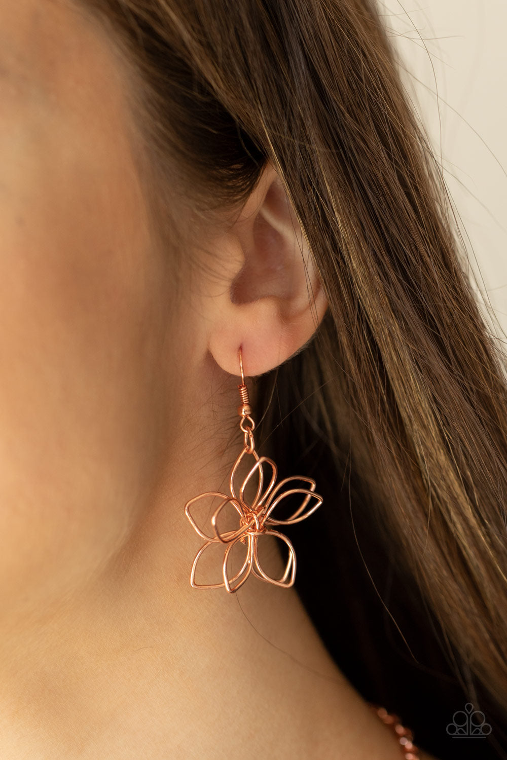 Paparazzi Accessories Flower Garden Fashionista - Copper Necklaces shiny copper wire delicately twists into oversized blossoms. Varying in size, the airy floral frames delicately link into an asymmetrical display as the layered frames elegantly pop beneath the collar. Features an adjustable clasp closure.