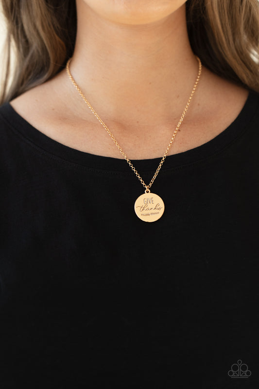 Give Thanks - Gold Inspirational Necklaces infused with feathery accents, a shiny gold disc is stamped in the phrase, "Give Thanks," at the bottom of a shimmery gold chain. Features an adjustable clasp closure.