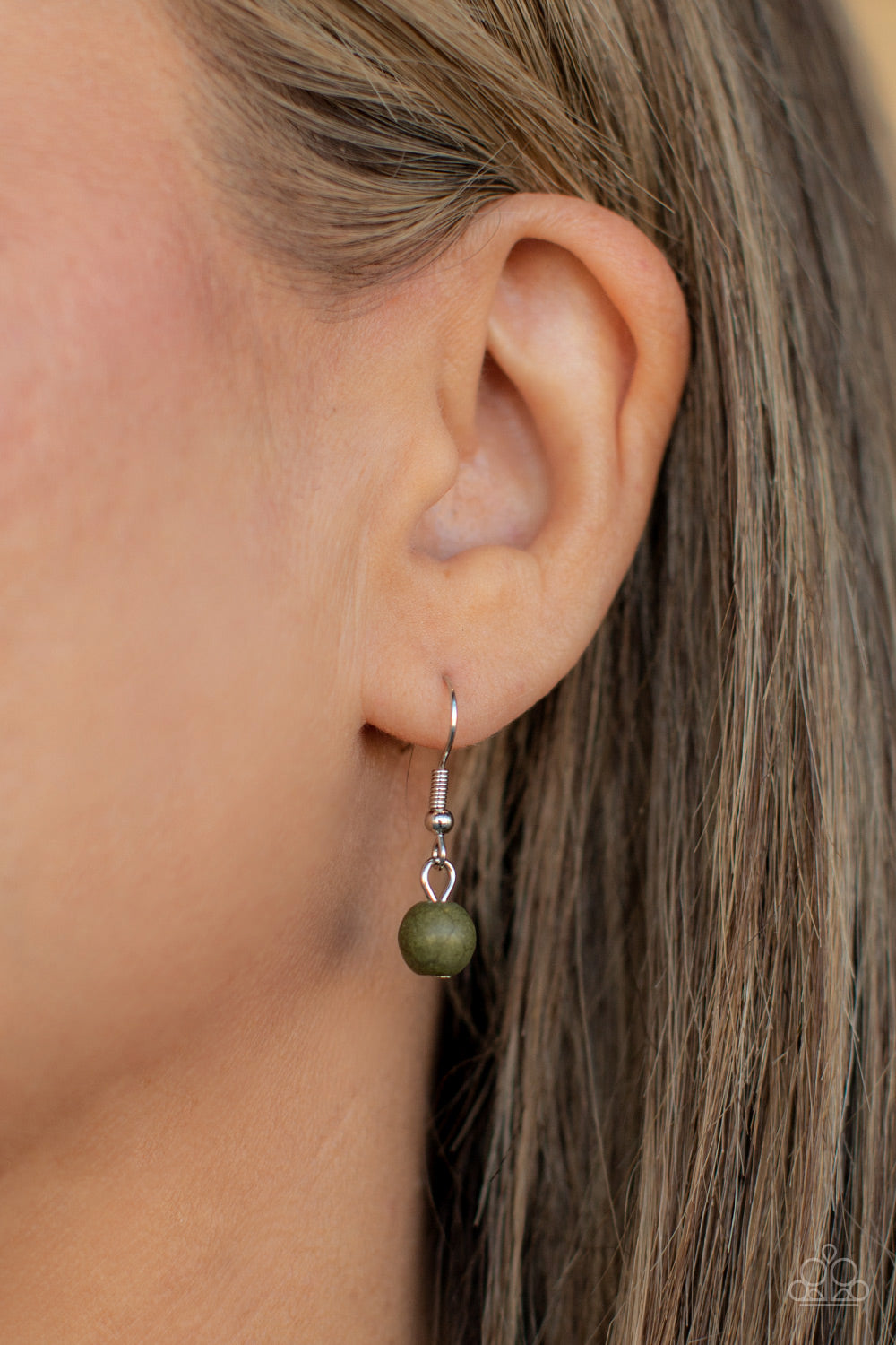 Paparazzi Accessories Sahara Suburb - Green Necklaces dainty silver chain is paired with a grounding green stone beaded chain below the collar. An oversized green stone adorns the center of an antiqued silver frame radiating with silver studded and wire-like detail, creating an authentic artisan inspired pendant at the bottom of the earthy chains. Features an adjustable clasp closure.