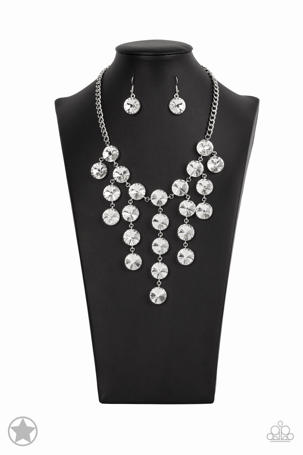 Spotlight Stunner - White Rhinestone Blockbuster Necklaces encased in sleek silver fittings, dramatically oversized white rhinestones delicately link into twinkly tassels that taper off into a jaw-dropping fringe below the collar. Features an adjustable clasp closure. Sold as one individual necklace. Includes one pair of matching earrings. Paparazzi Jewelry is lead and nickel free so it's perfect for sensitive skin too!