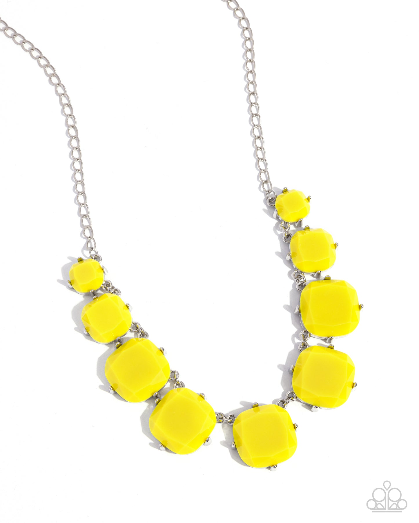 Encased in pronged silver fittings, faceted Illuminating beads gradually increase in size as they link below the collar, creating a flamboyant pop of color. Features an adjustable clasp closure.  Sold as one individual necklace. Includes one pair of matching earrings.