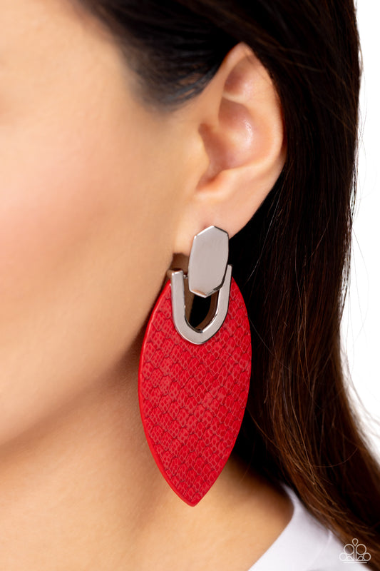 Paparazzi Accessories - Wildly Workable - Red Earrings featuring python-like texture, an oval Fire Whirl leather frame attaches to a bold silver fitting, creating a wild lure. Earring attaches to a standard post fitting.  Sold as one pair of post earrings.