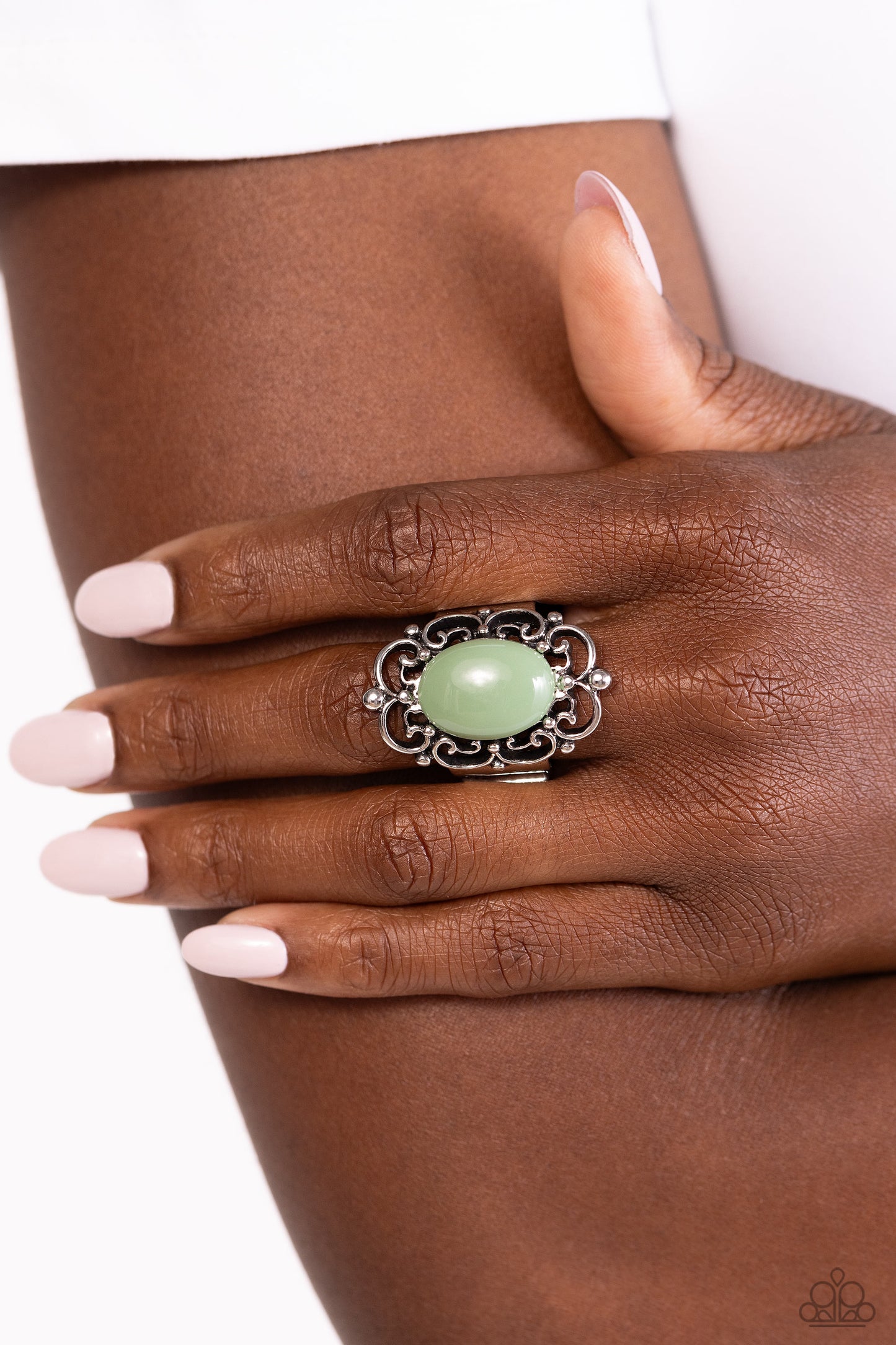 Paparazzi Accessories - Happily EVERGLADE After - Green Rings glassy Loden Frost bead glistens atop a backdrop of silver vine-like filigree, blooming into an enchanting pop of color atop the finger. Features a stretchy band for a flexible fit.  Featured inside The Preview at Made for More!  Sold as one individual ring.