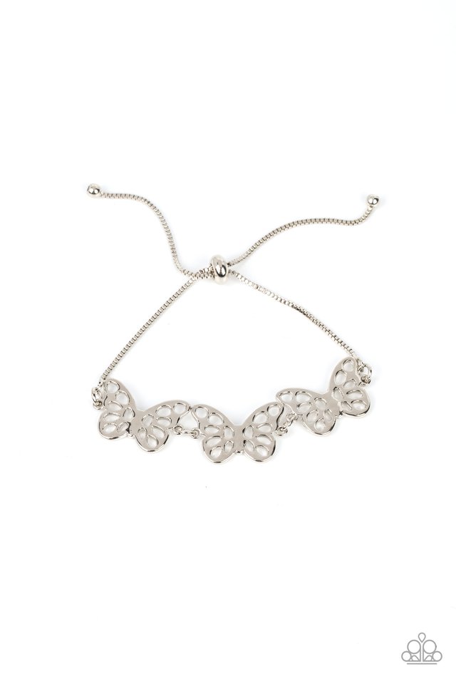 Featuring airy stenciled cutouts, three silver butterflies delicately connect at the center of a silver box chain for a whimsical fashion. Features an adjustable sliding bead closure.  Sold as one individual bracelet.