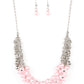 Paparazzi Accessories - Bonus Points - Pink Pearl Necklace a bubbly cluster of Gossamer Pink pearls are bunched together between hanging silver beads that dangle between jampacked rows of silver rings, resulting in exaggerated effervescence below the collar. Features an adjustable clasp closure.  Sold as one individual necklace. Includes one pair of matching earrings.