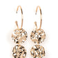 Paparazzi Accessories - Sending Shock Waves - Gold Earrings a linked pair of hammered gold discs glides along a classic gold hoop, adding an edgy twist to the timeless look. Earring attaches to a standard post fitting. Hoop measures approximately 1 1/4" in diameter.  Sold as one pair of hoop earrings.