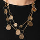 Paparazzi Accessories - Hammered Horizons - Gold Necklaces Infused along a double-stranded gold chain, smooth gold hoops and abstract, hammered gold discs fall down the neckline for an edgy, boisterous display. Features an adjustable clasp closure.  Sold as one individual necklace. Includes one pair of matching.