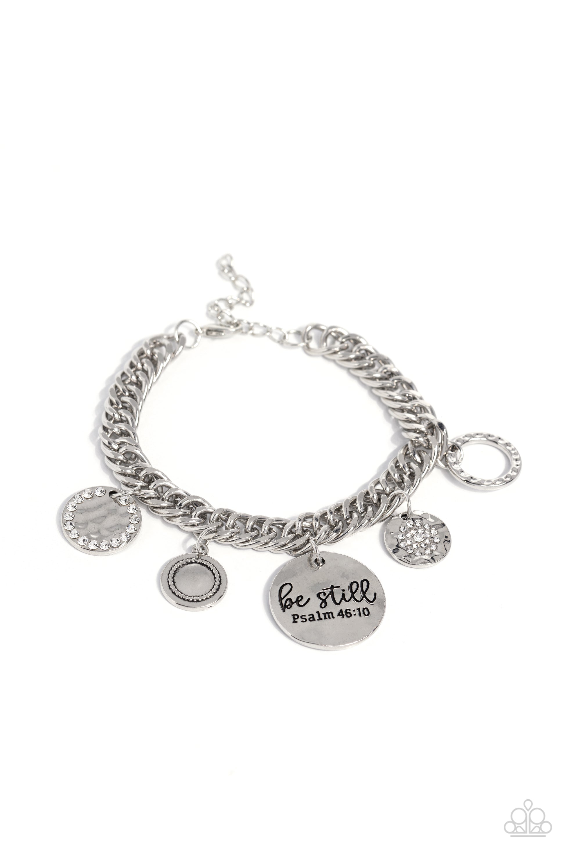 Paparazzi Accessories - Glitter are Grace - Silver Bracelets gliding from a thick silver curb chain, a collection of refined charms add some texture and shimmer to this monochromatic mash-up. An oversized, hammered disc is stamped with the phrase "be still" with the scripture reference "Psalm 48:10" listed underneath it. A smaller, hammered disc with a sprinkle of white rhinestones in its center and a silver disc featuring a scalloped ring in its center glide next to the oversized silver disc.