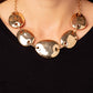 Paparazzi Accessories - That RING You Do - Gold Necklaces oversized, oblong gold discs with a light hammered sheen cascade down the neckline from a classic gold chain. Oversized rings in the same hue link the abstract discs together completing the monochromatic, industrial design. Features an adjustable clasp closure.  Sold as one individual necklace. Includes one pair of matching earrings.