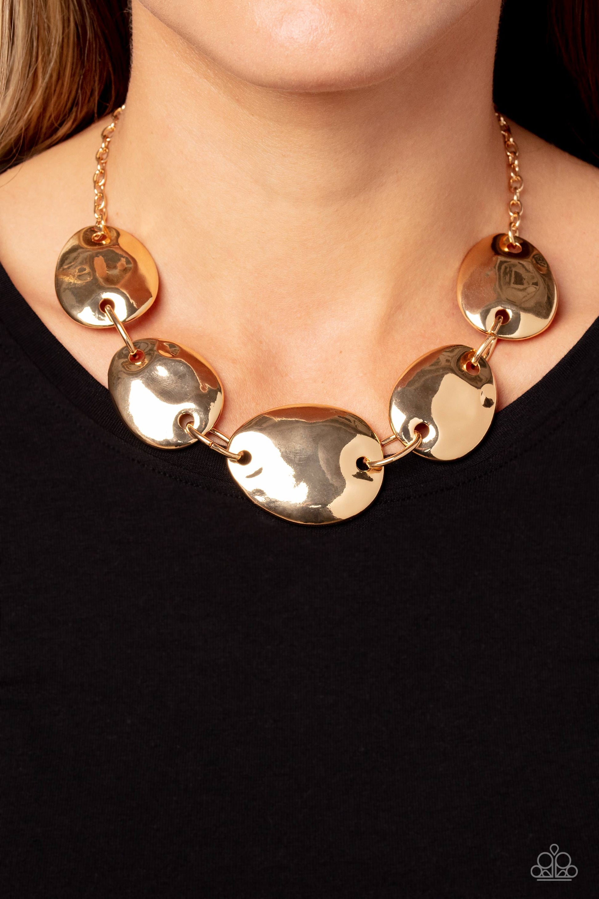 Paparazzi Accessories - That RING You Do - Gold Necklaces oversized, oblong gold discs with a light hammered sheen cascade down the neckline from a classic gold chain. Oversized rings in the same hue link the abstract discs together completing the monochromatic, industrial design. Features an adjustable clasp closure.  Sold as one individual necklace. Includes one pair of matching earrings.