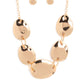 Paparazzi Accessories - That RING You Do - Gold Necklaces oversized, oblong gold discs with a light hammered sheen cascade down the neckline from a classic gold chain. Oversized rings in the same hue link the abstract discs together completing the monochromatic, industrial design. Features an adjustable clasp closure.  Sold as one individual necklace. Includes one pair of matching earrings.