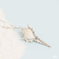 Paparazzi Accessories - Sea CONCH - White Necklaces cascading down the chest from an elongated silver chain sporadically infused with silver studs, a conch shell lined with glittering silver creates a stunning seaside statement. Features an adjustable clasp closure.  Sold as one individual necklace. Includes one pair of matching earrings.