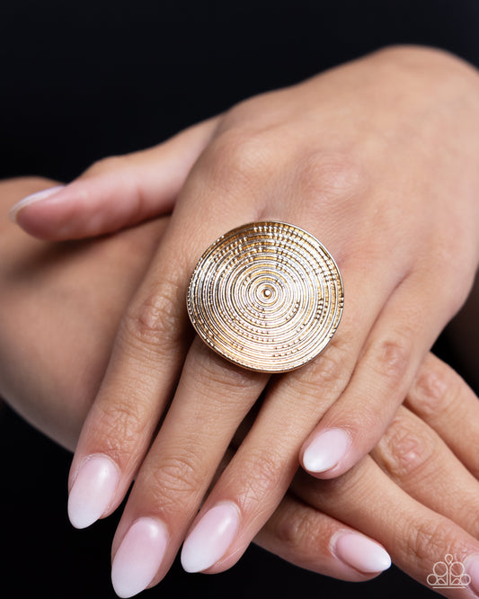 <p data-mce-fragment="1">Featuring an understated dot motif, shimmery textured circles radiate into an oversized, dizzying, concaved gold frame atop the finger. Features a stretchy band for a flexible fit.</p> <p data-mce-fragment="1"><i data-mce-fragment="1">Sold as one individual ring.</i></p>